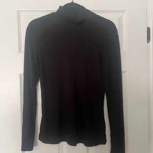 Women’s size L Herou black long sleeved turtleneck teeshirt.